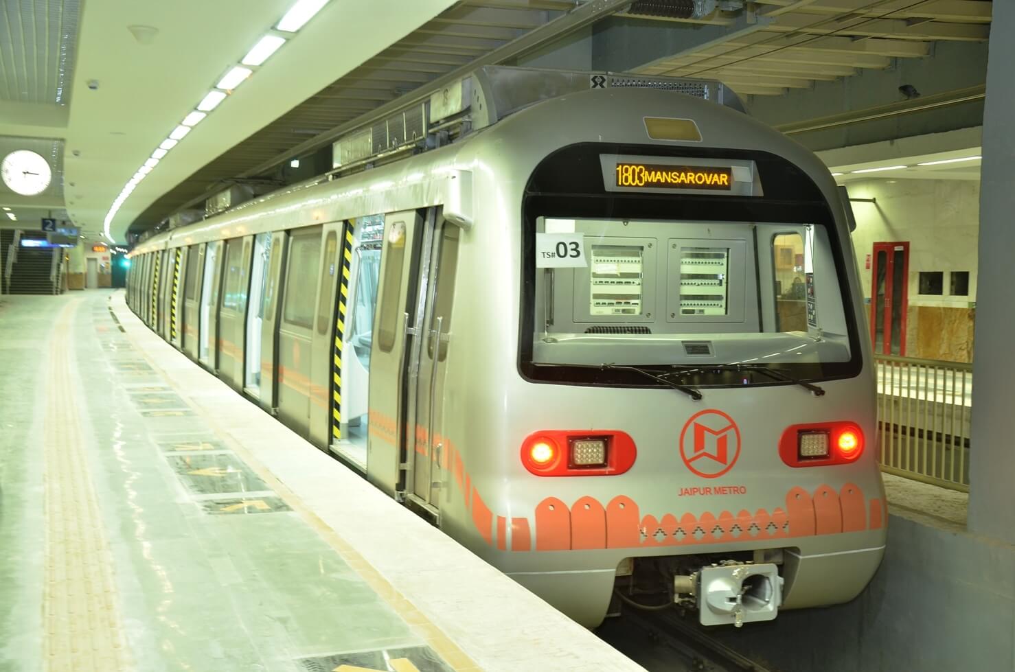 Modern Jaipur Metro train at station platform showcasing clean, efficient public transportation in Pink City